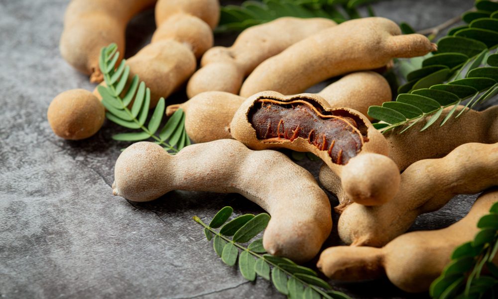 fresh sweet ripe tamarind on dark backgroud