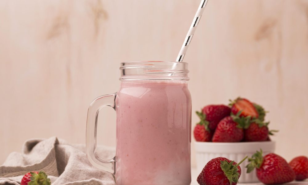 front-view-strawberry-milkshake-with-straw